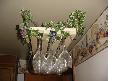 Small pic of hanging bar glass rack with imitation vines around the chains